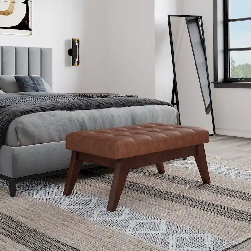 Banc ottoman rectangulaire capitonné en similicuir avec pieds en bois foncé, style milieu du siècle