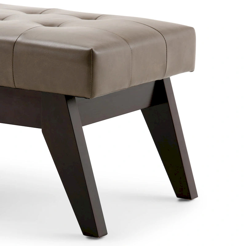 Banc ottoman rectangulaire capitonné en similicuir avec pieds en bois foncé, style milieu du siècle