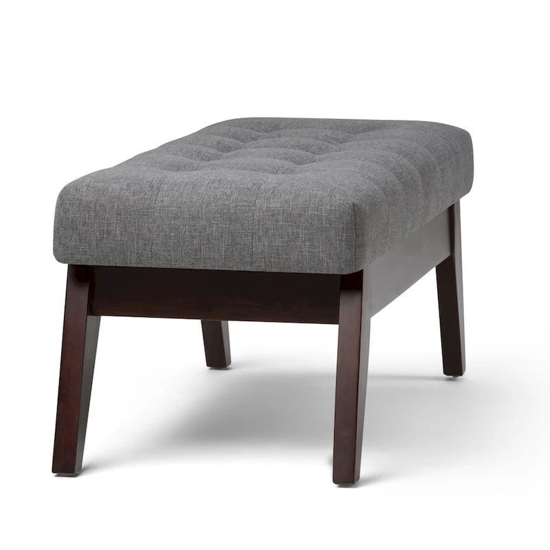 Banc ottoman rectangulaire capitonné en similicuir avec pieds en bois foncé, style milieu du siècle