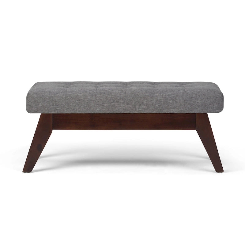 Banc ottoman rectangulaire capitonné en similicuir avec pieds en bois foncé, style milieu du siècle