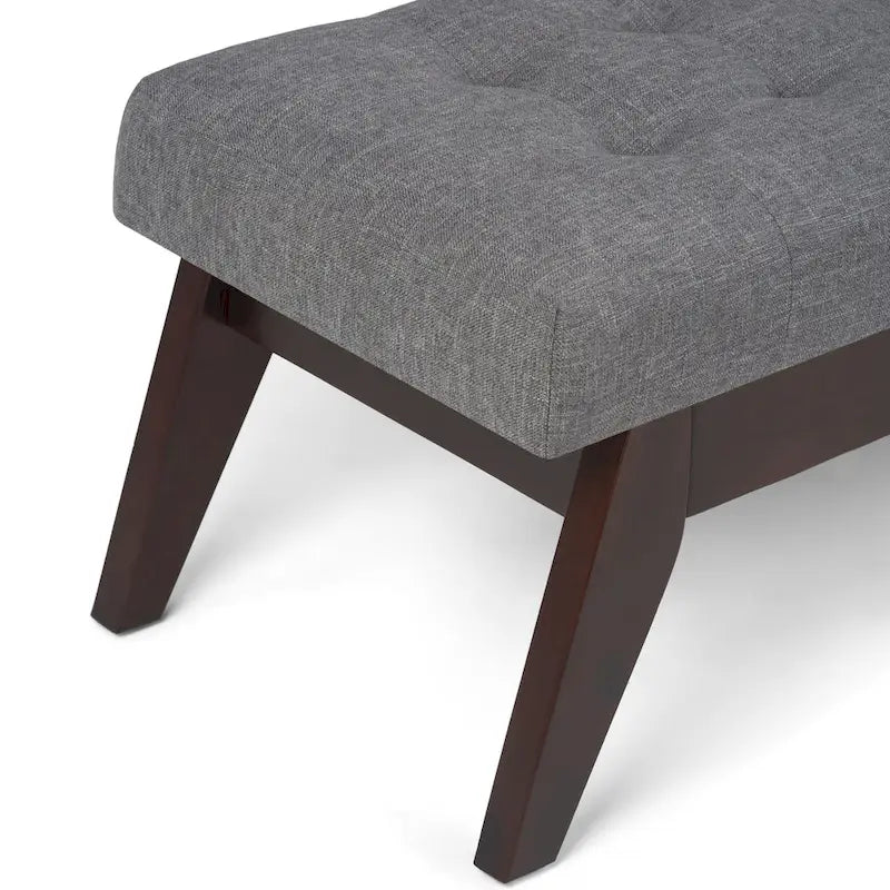 Banc ottoman rectangulaire capitonné en similicuir avec pieds en bois foncé, style milieu du siècle