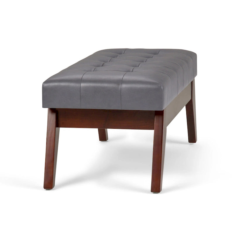 Banc ottoman rectangulaire capitonné en similicuir avec pieds en bois foncé, style milieu du siècle