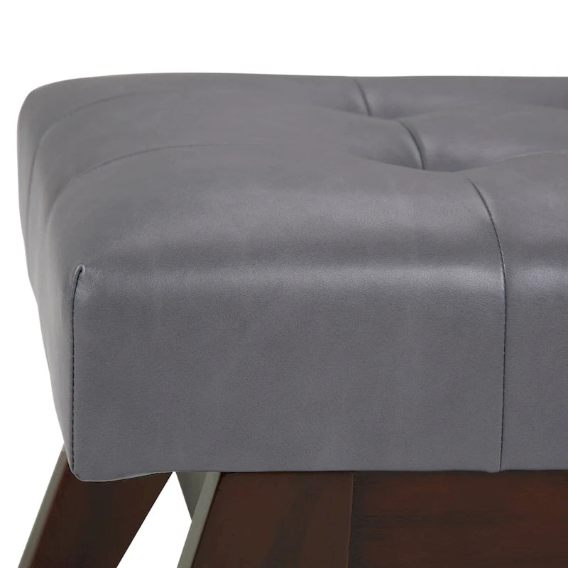 Banc ottoman rectangulaire capitonné en similicuir avec pieds en bois foncé, style milieu du siècle