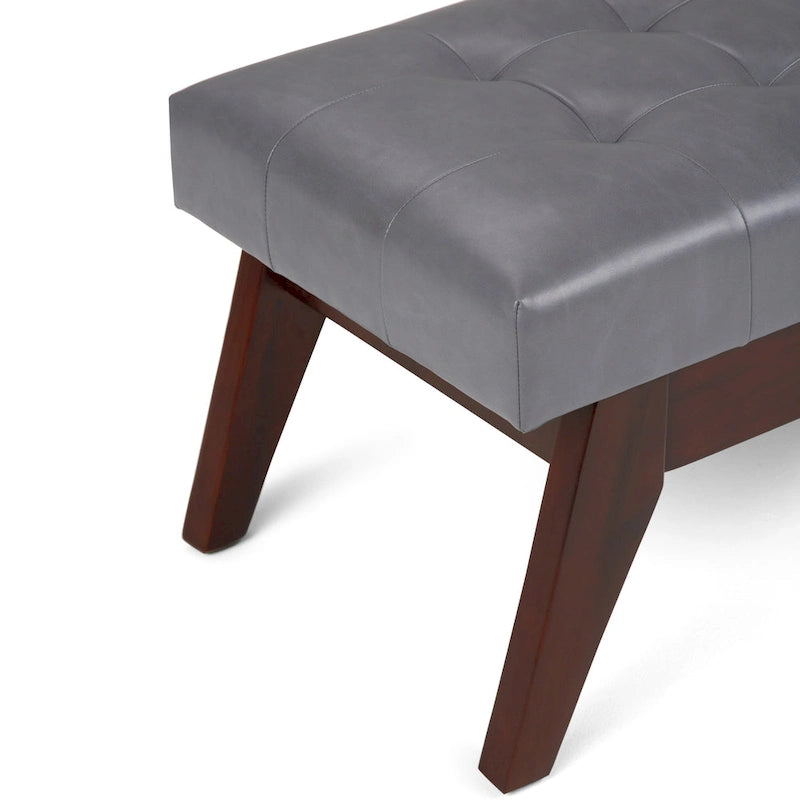 Banc ottoman rectangulaire capitonné en similicuir avec pieds en bois foncé, style milieu du siècle