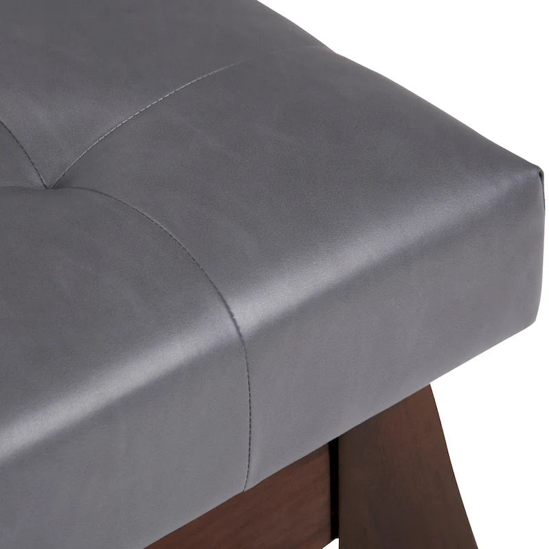 Banc ottoman rectangulaire capitonné en similicuir avec pieds en bois foncé, style milieu du siècle