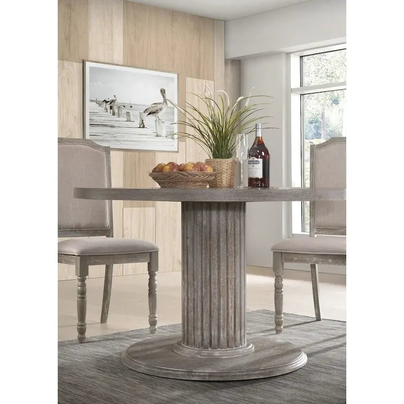 Table de salle à manger sur pied en bois de récupération gris rond, finition vieillie